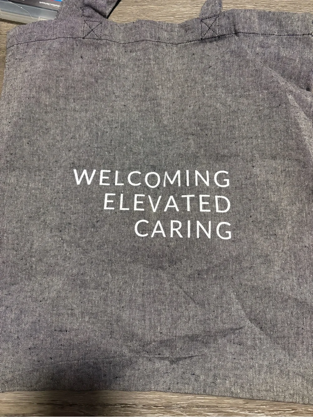 Delta Airlines Grey Canvas Tote with White Slogan - 'Welcoming Elevated Caring'